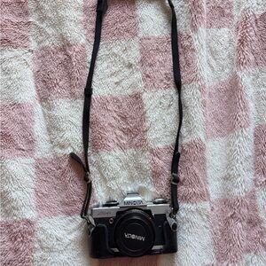 Minolta Black and Silver Camera with Strap